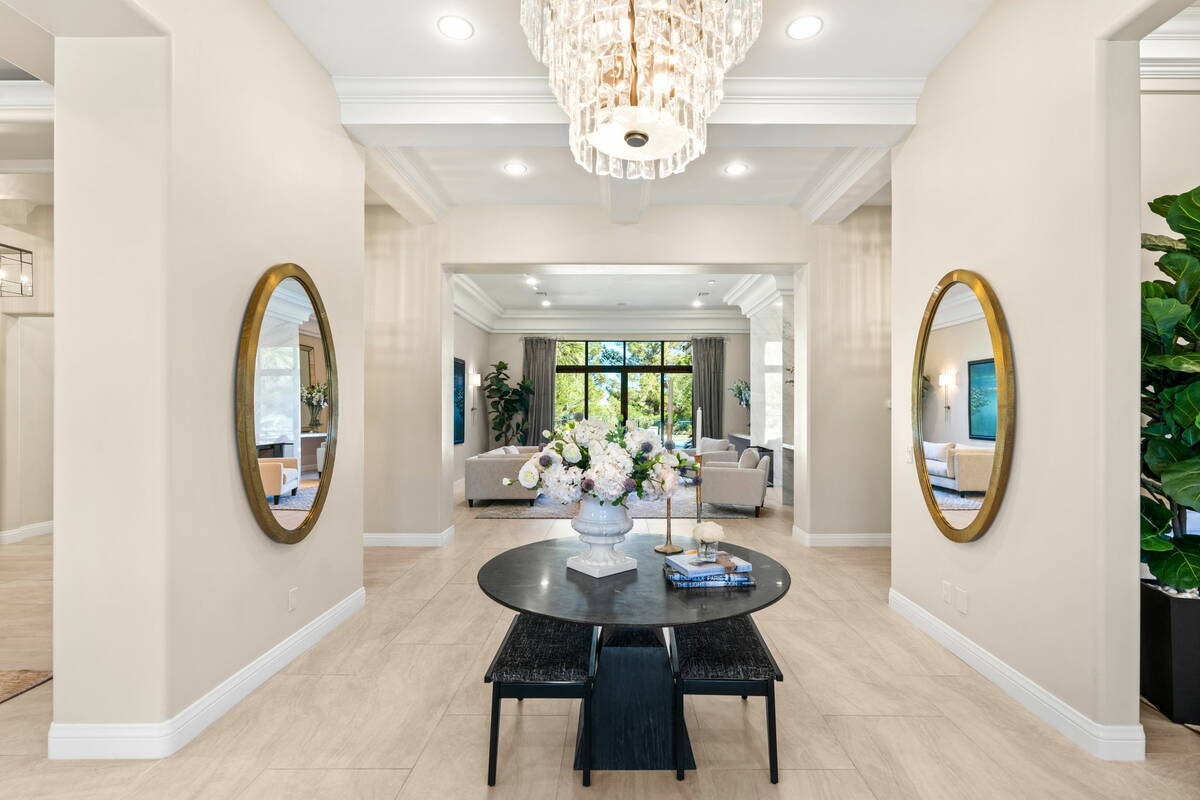 The John Sullivan Group This Southern Highlands Country Club mansion has hit the Las Vegas mark ...