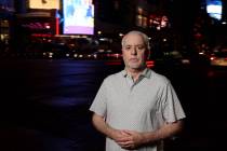 Review-Journal investigative reporter Jeff German poses on the Strip in Las Vegas on Wednesday, ...