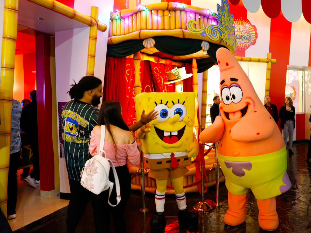 SpongeBob SquarePants and Patric Star greet guests as they enter SpongeBob's Crazy Carnaval Rid ...
