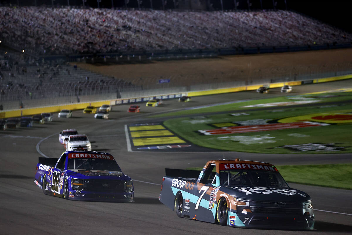 Kyle Busch (7) leads the pack during the Victoria's Voice Foundation 200 NASCAR Craftsman Truck ...