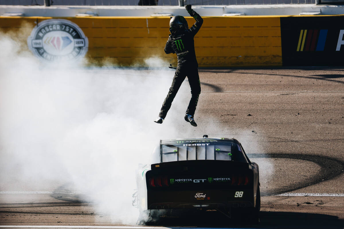 Riley Herbst celebrates winning first place in the NASCAR Xfinity Series race at the Las Vegas ...