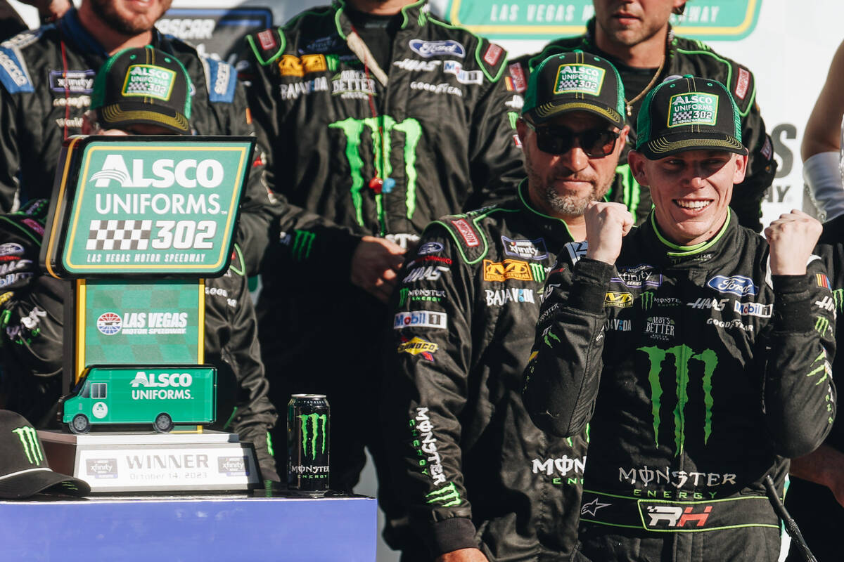 Riley Herbst celebrates winning first place in the NASCAR Xfinity Series race at the Las Vegas ...