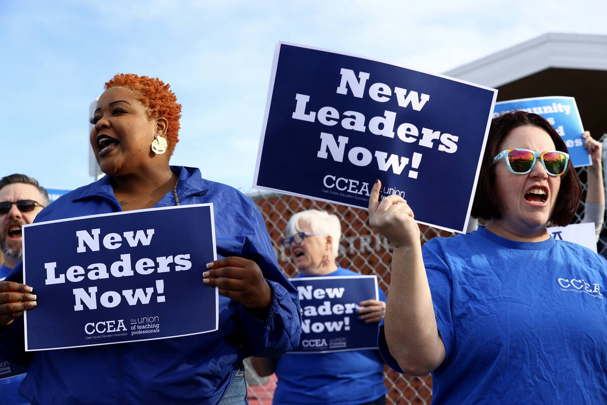 CCEA teachers union members push for new leadership during a protest before a school board meet ...
