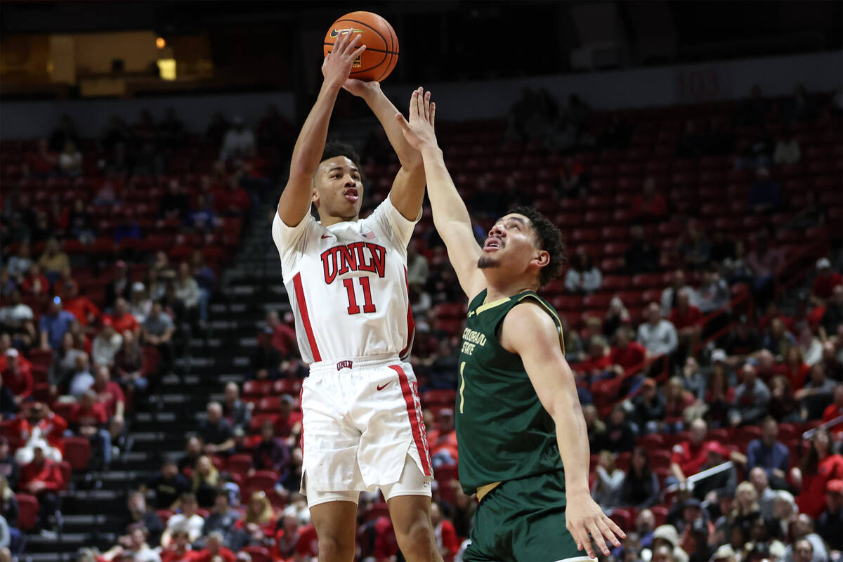 UNLV Rebels guard Dedan Thomas Jr. (11) shoots against Colorado State Rams forward Joel Scott ( ...