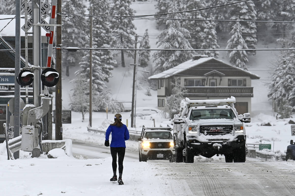 local runner Jenelle Potvin goes on her daily jog along Bridge Street on Friday, March 1, 2024, ...