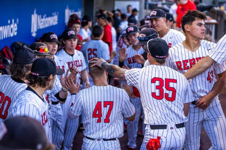 UNLV outfielder Austin Kryszczuk (47) is congratulated on a great catch against Arizona State d ...