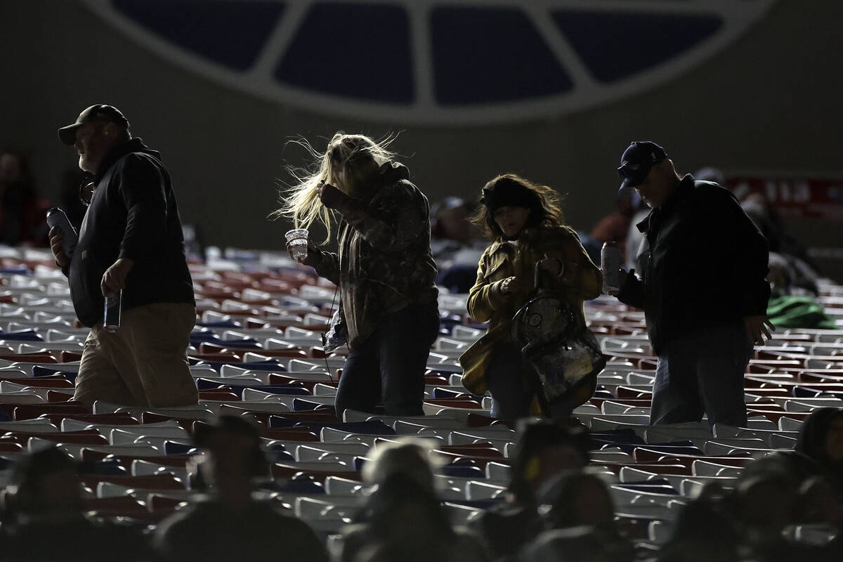 Fans traverse the stands amid high wind conditions during the Victoria's Voice Foundation 200 N ...