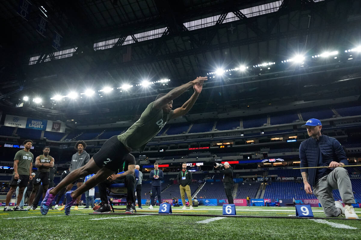 Toledo defensive back Quinyon Mitchell runs a drill at the NFL football scouting combine, Frida ...