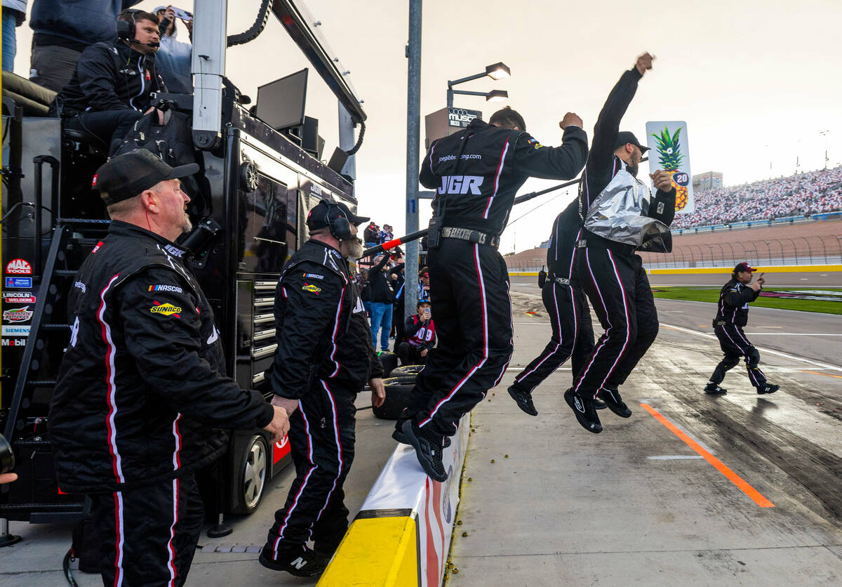 The pit crew of driver John Hunter Nemechek, 20, celebrate their win in the LiUNA NASCAR Xfinit ...