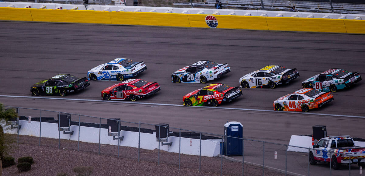 Drivers Riley Herbst, 98, edges ahead of Austin Hill, 21, during the LiUNA NASCAR Xfinity Serie ...