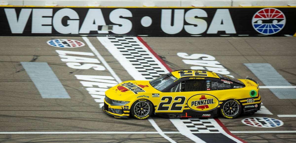 Driver Joey Logano, #22 of Team Penske Ford, makes a lap during the Pennzoil 400 practice stage ...