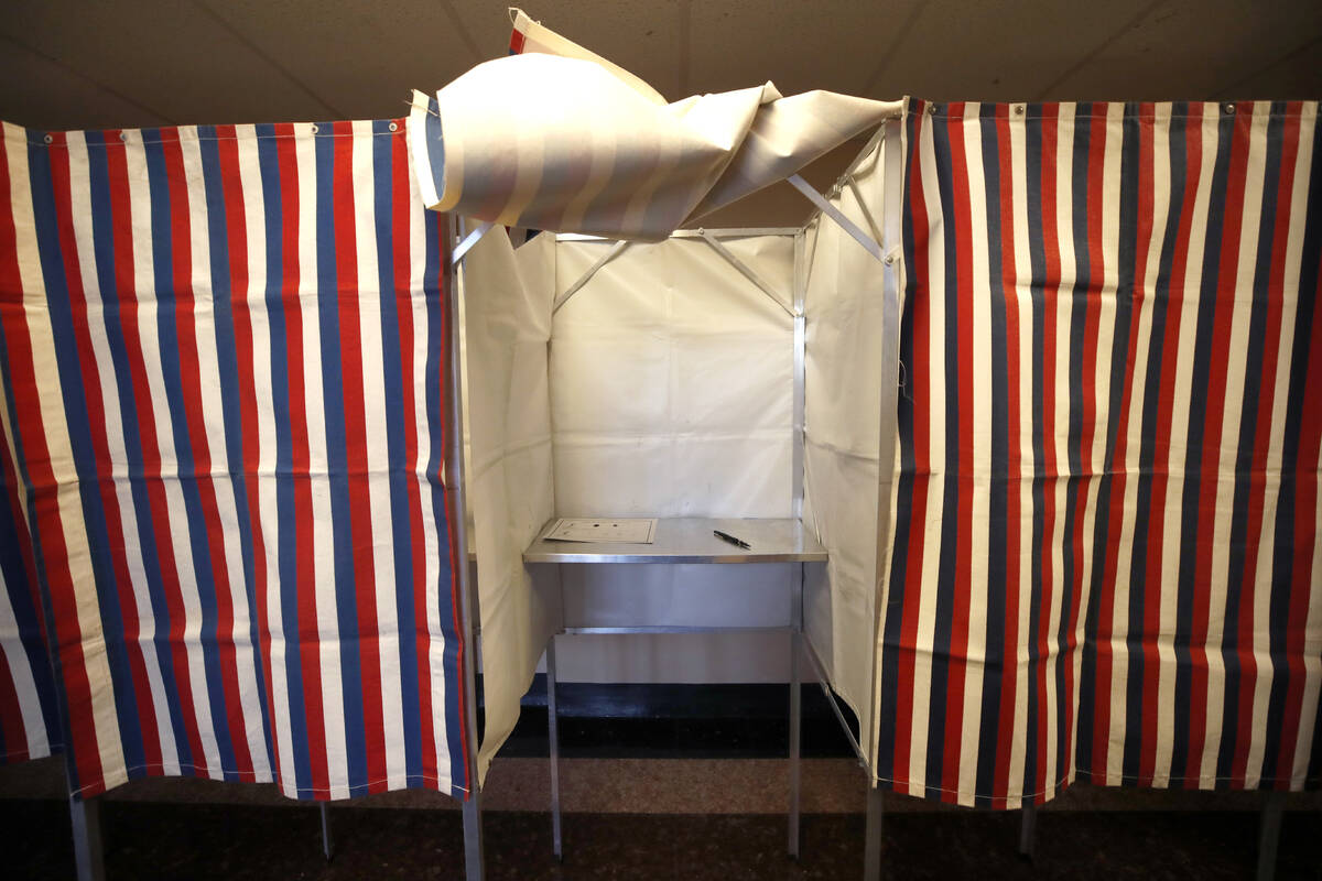 A booth is ready for a voter, Feb. 24, 2020, at City Hall in Cambridge, Mass. (AP Photo/Elise A ...