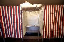 A booth is ready for a voter, Feb. 24, 2020, at City Hall in Cambridge, Mass. (AP Photo/Elise A ...