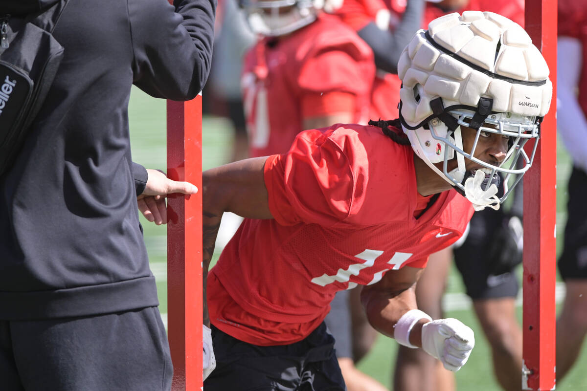 UNLV wide receiver Ricky White III runs a drill during the first day of spring practice Saturda ...