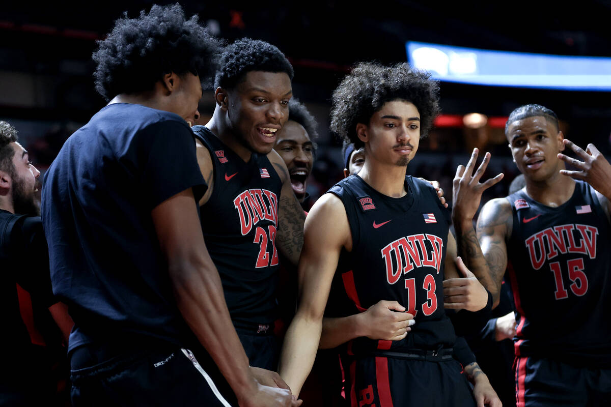 UNLV Rebels guard Brooklyn Hicks (13) falls back into the bench after scoring a three-pointer d ...