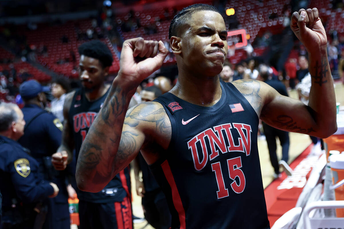 UNLV Rebels guard Luis Rodriguez (15) celebrates while leaving the court after defeating the Sa ...