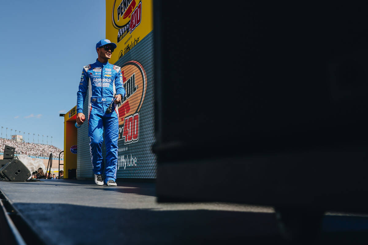 Race driver Kyle Larson walks out during driver introductions at the Pennzoil 400 NASCAR Cup Se ...