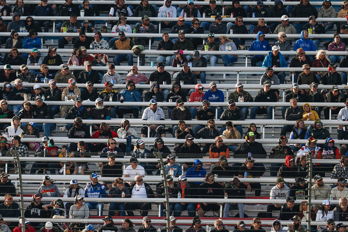 A crowd watches the Pennzoil 400 NASCAR Cup Series race from the stands at the Las Vegas Motor ...