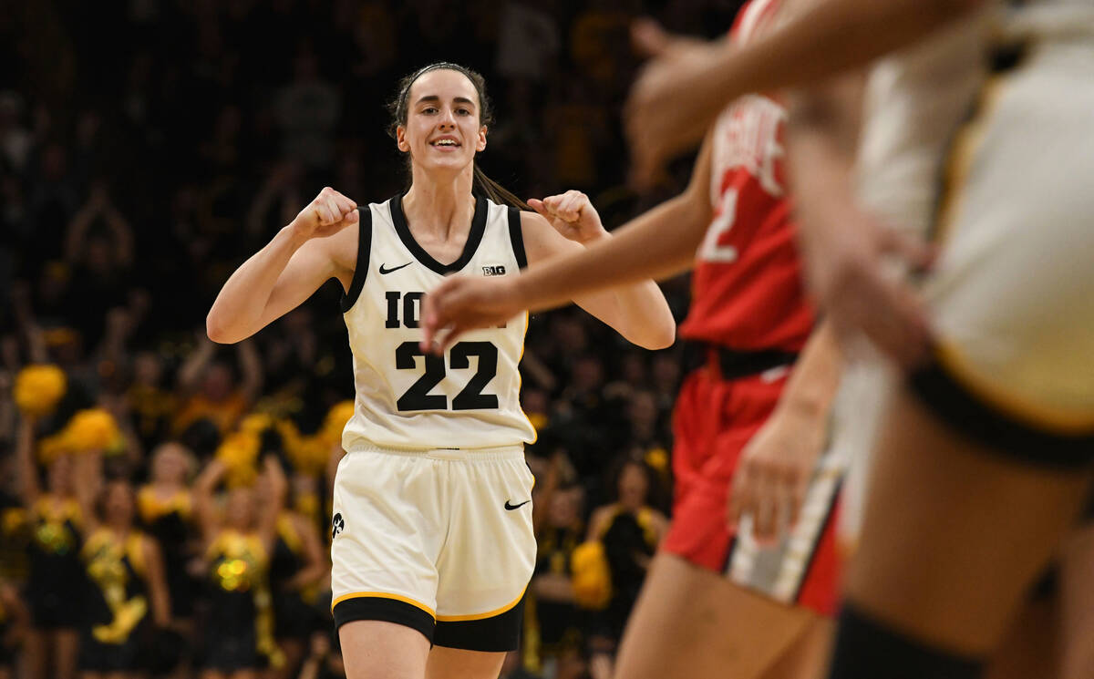 Iowa guard Caitlin Clark (22) celebrates after a foul by Ohio State during the second half of a ...