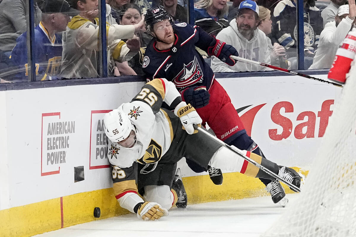 Columbus Blue Jackets defenseman Damon Severson (78) checks Vegas Golden Knights right wing Kee ...