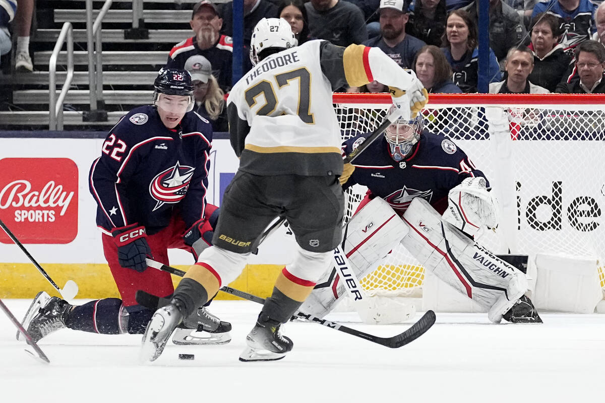 Vegas Golden Knights defenseman Shea Theodore (27) skates in against Columbus Blue Jackets defe ...