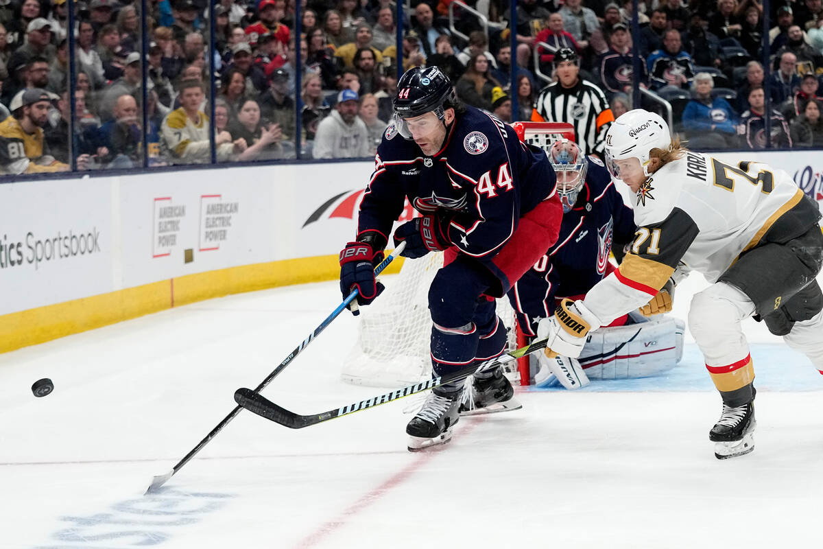 Columbus Blue Jackets defenseman Erik Gudbranson (44) and Vegas Golden Knights center William K ...