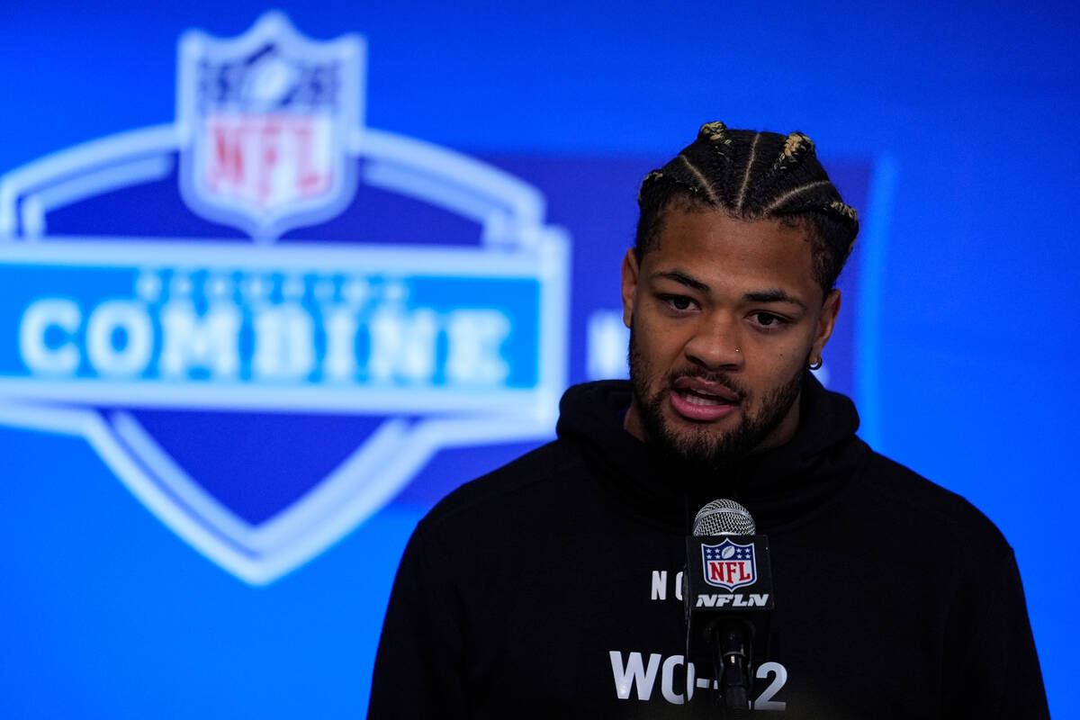 Washington wide receiver Rome Odunze speaks during a press conference at the NFL football scout ...