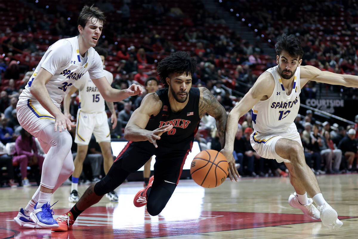 UNLV Rebels forward Isaiah Cottrell (0) dives after the ball against San Jose State Spartans fo ...