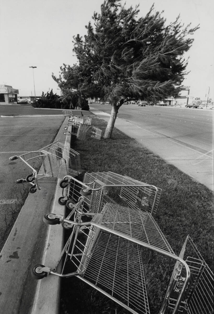 Shopping carts are seen blown over in the wind at the corner of Eastern and Sahara Avenues Febr ...