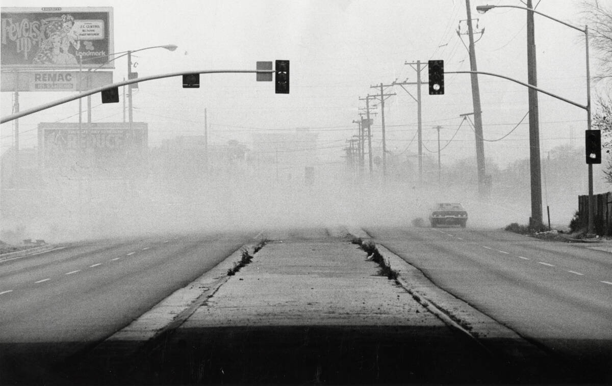 Dust and sand obscures the road during a wind storm February 20, 1977, in Las Vegas. (Lenny Ign ...