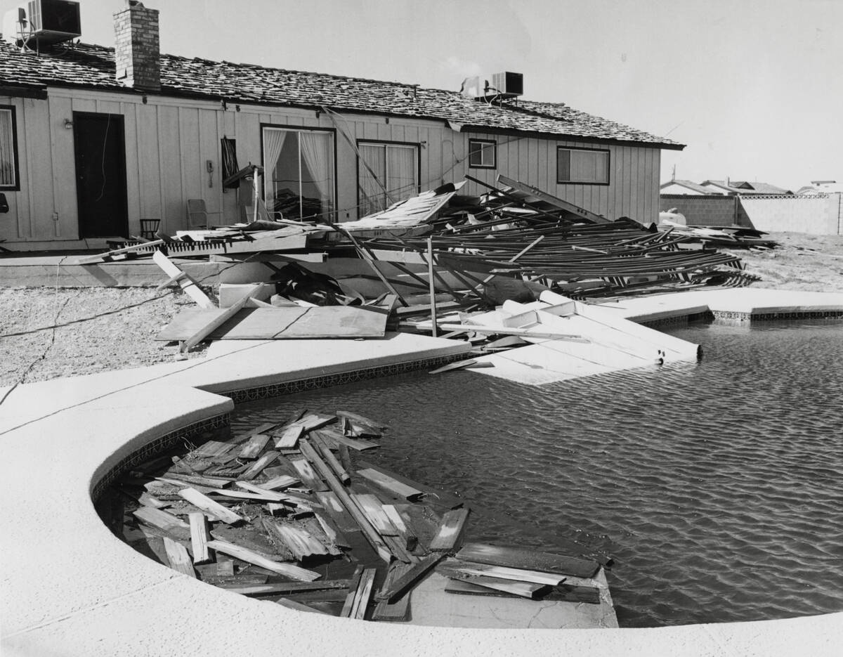 Housing material is seen in a pool after a wind storm February 21, 1977, in Las Vegas. (File/La ...