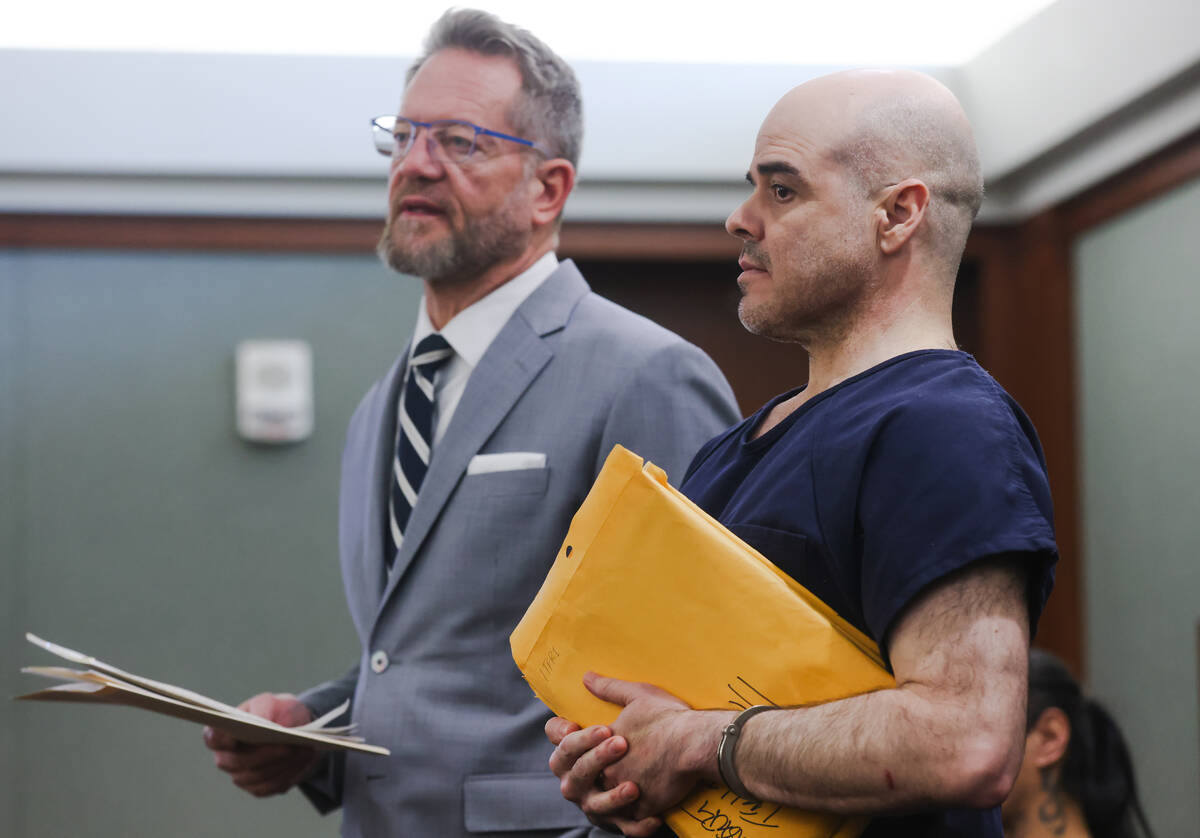 Attorney Robert Draskovich, left, addresses the court next to his client Robert Telles, right, ...
