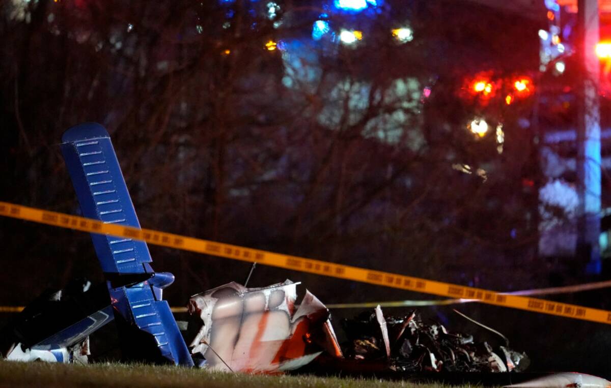 Debris from a fatal small plane crash is seen alongside Interstate 40 near mile marker 202 on M ...