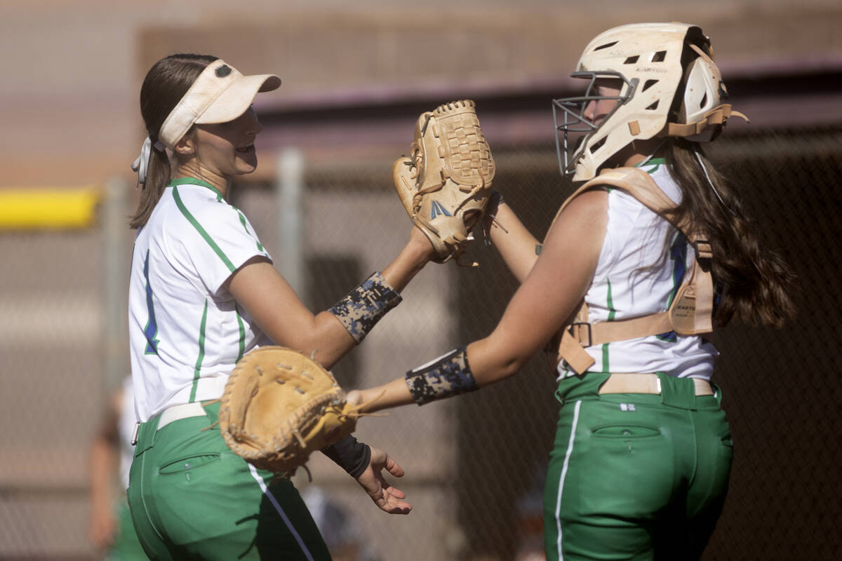 Green Valley pitcher Avari Morris, left, celebrates with catcher Rustie Riley after she pitched ...