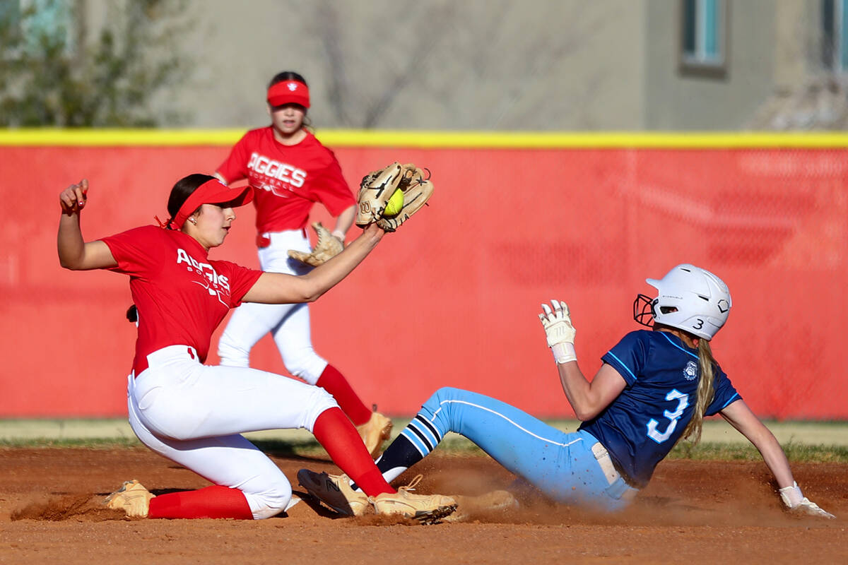 Arbor View shortstop Madilyn Lowy catches to out Centennial's Ashley Madonia (3) during a high ...