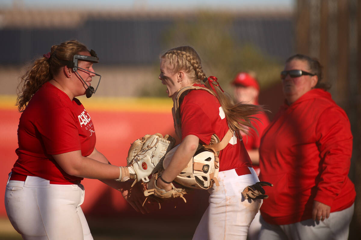 Arbor View pitcher Audrey Melton, left, and catcher Kelsie Phares celebrate after not allowing ...