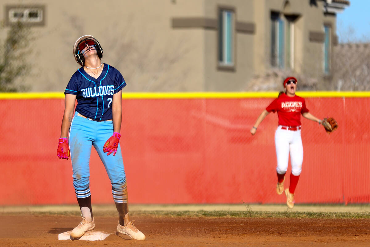 Centennial's Juliana Bosco (2) reacts after Arbor View ended the inning during a high school so ...