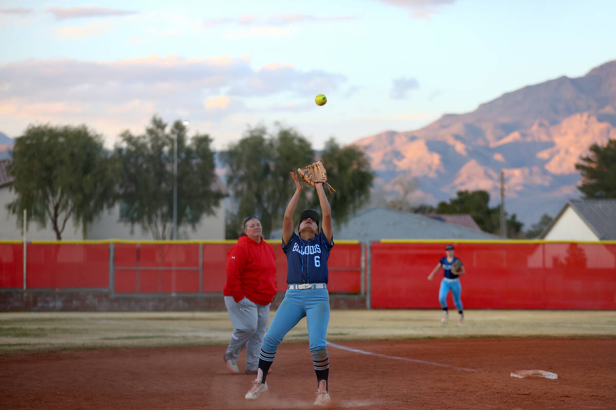 Centennial's Leeah Ibarra (6) prepares to catch for an out over Arbor View during a high school ...