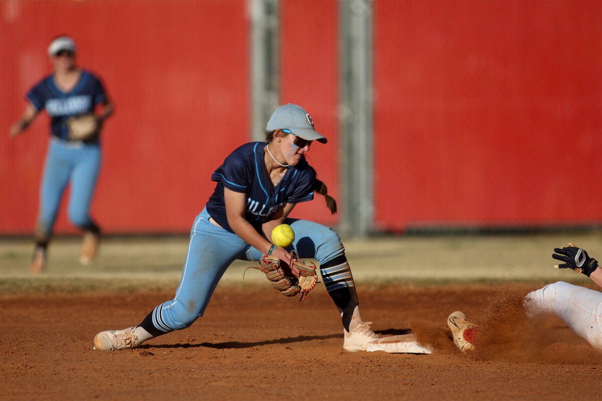 Centennial's Juliana Bosco (2) fumbles a catch while Arbor View makes it to second base during ...