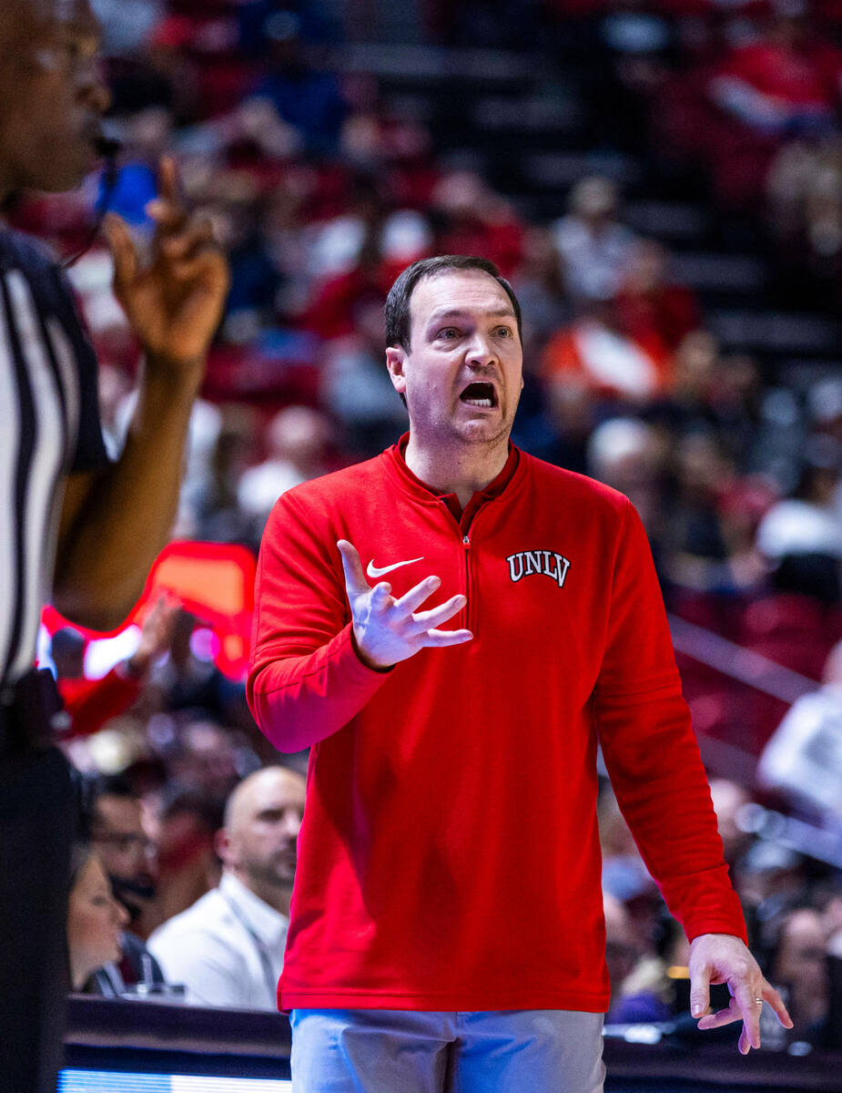 UNLV head coach Kevin Kruger makes a call against the San Diego State Aztecs during the second ...