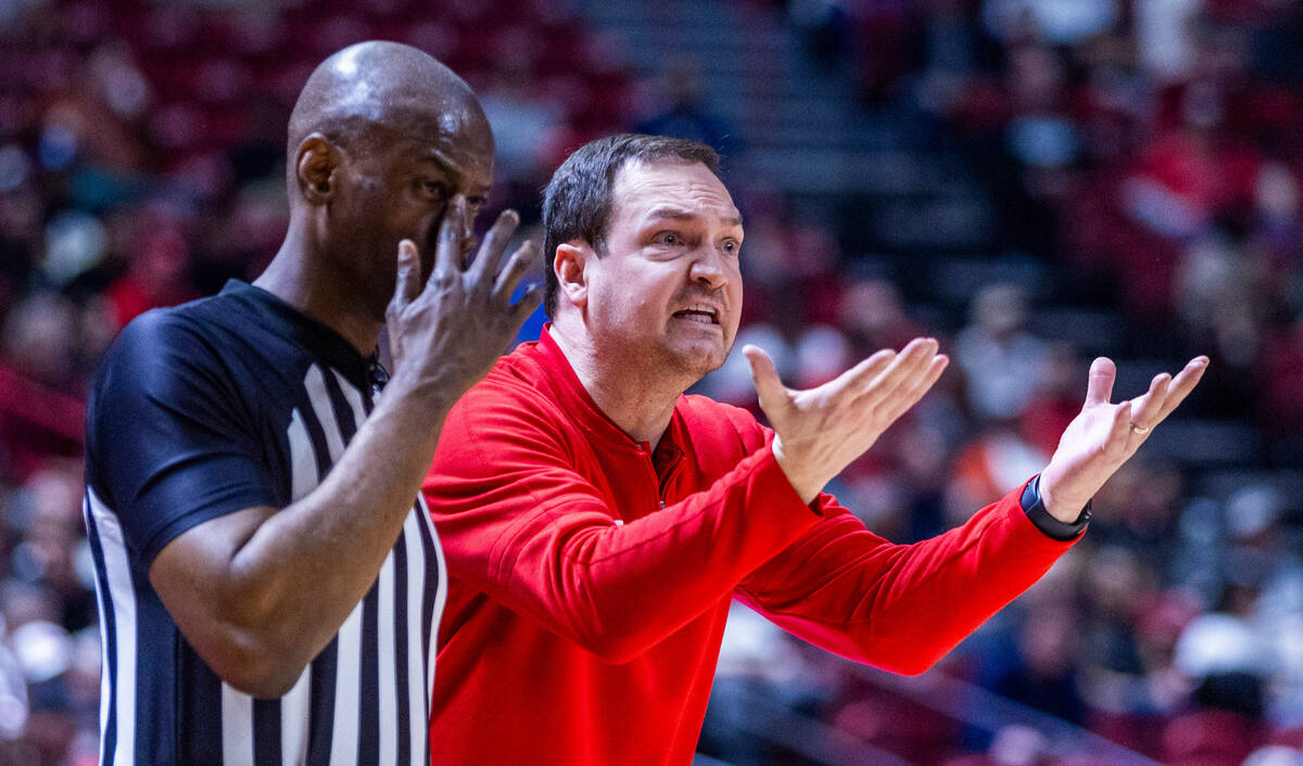 UNLV head coach Kevin Kruger makes his appeal with the refereee against the San Diego State Azt ...