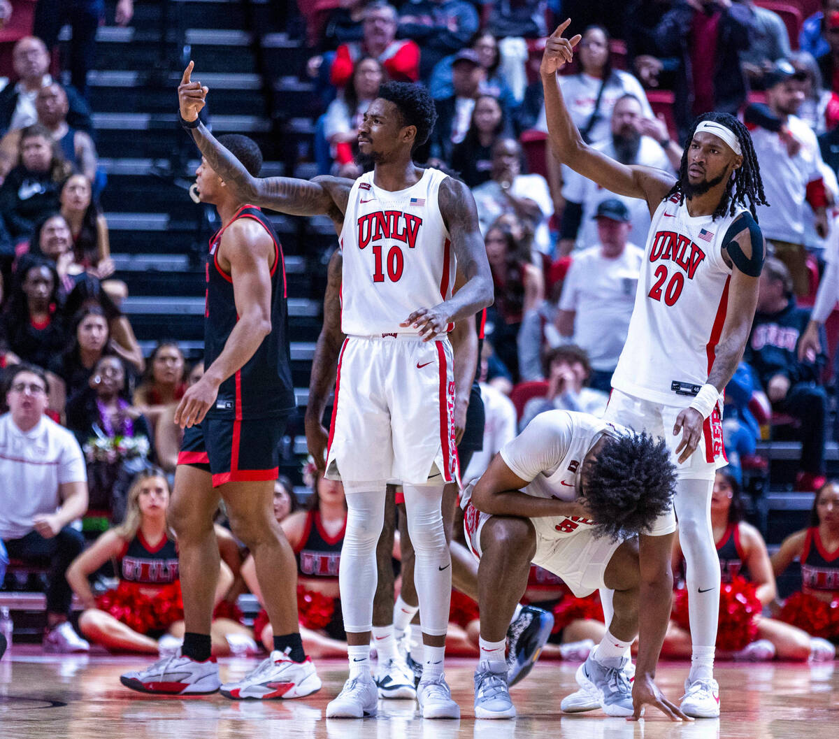 UNLV forward Rob Whaley Jr. (5) reacts to an elbow to the face by the San Diego State Aztecs du ...