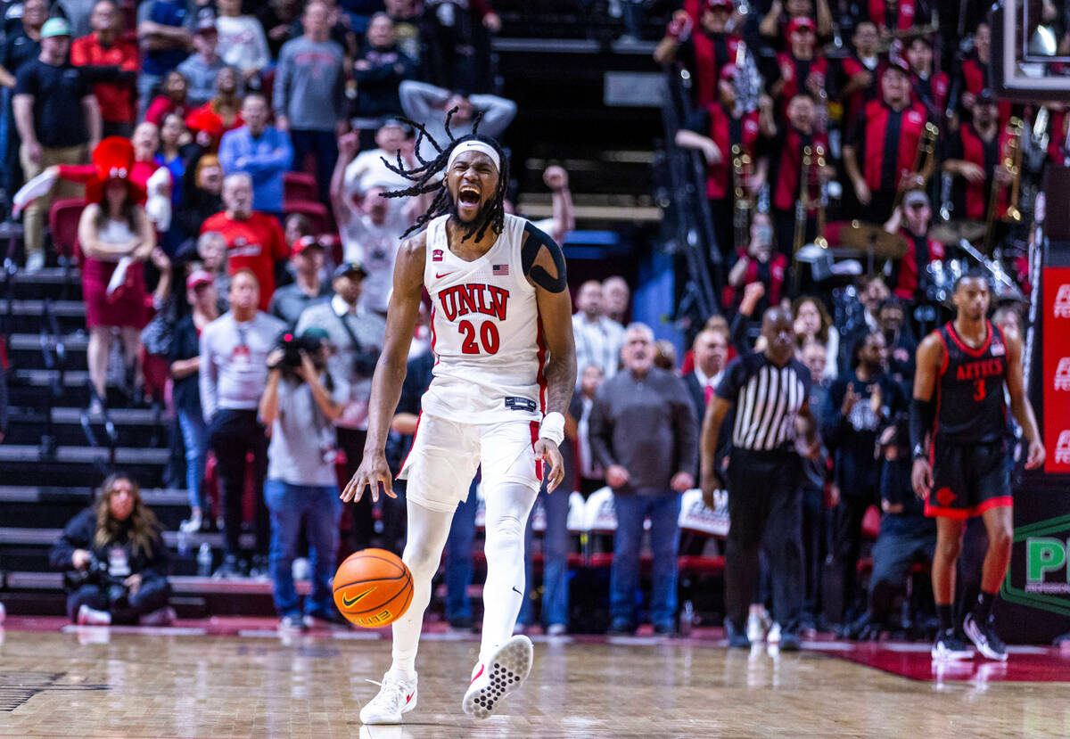 UNLV forward Keylan Boone (20) celebrates a critical turnover late in the game against the San ...