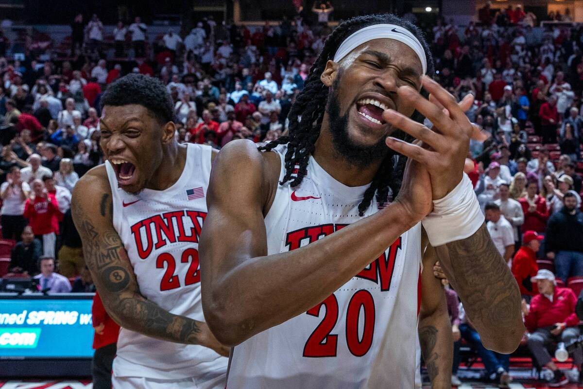 UNLV forward Keylan Boone (20) and UNLV forward Karl Jones (22) celebrate their win over the Sa ...