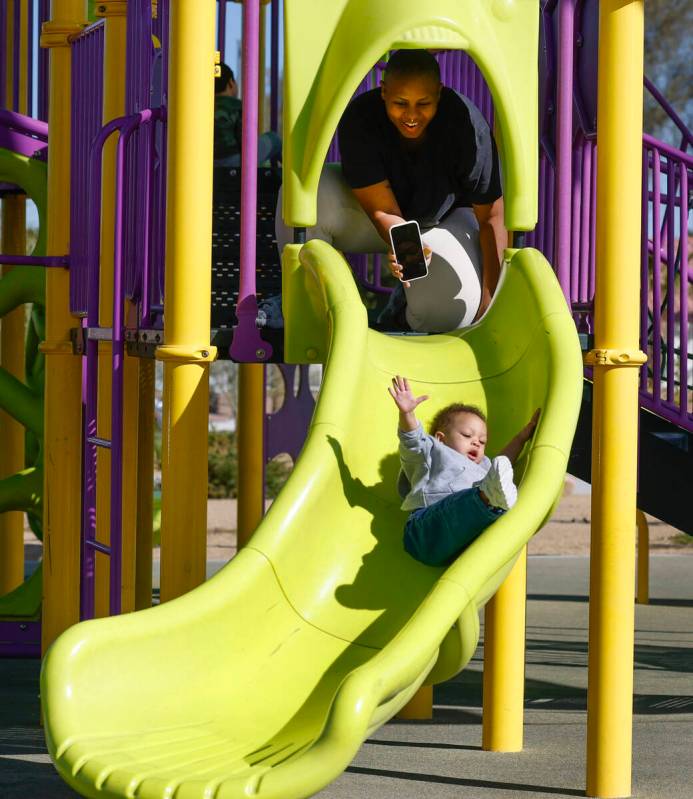 Aiyana Flores plays with her 14-month-old daughter Laelia at Echo Trail Park, on Tuesday, March ...