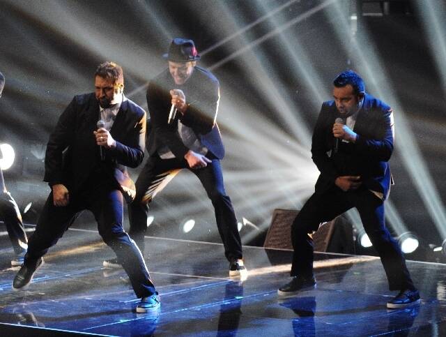 Joey Fatone, left, Justin Timberlake and Chris Kirkpatrick of N Sync perform at the MTV Video ...