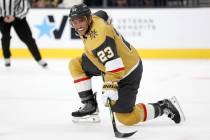 Golden Knights defenseman Alec Martinez (23) gets up from the ice during the second period of a ...
