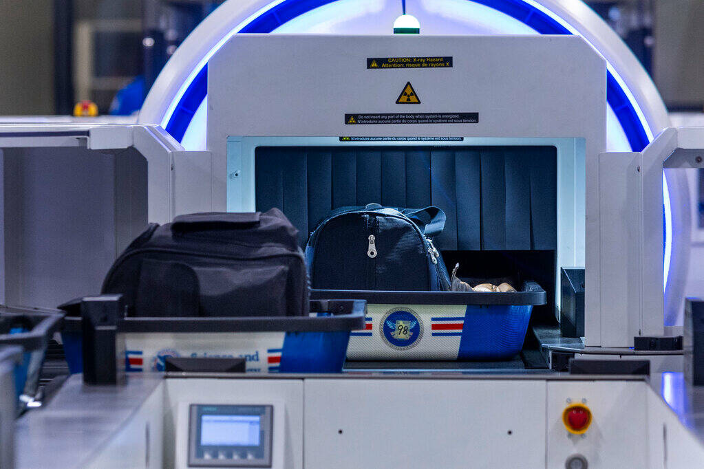 Baggage is screened as the Transportation Security Administration and Science and Technology Di ...