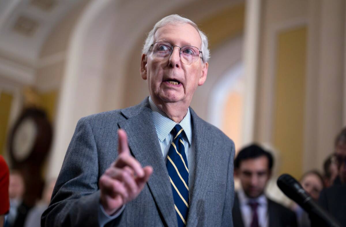 Senate Minority Leader Mitch McConnell, R-Ky., speaks to reporters at the Capitol in Washington ...