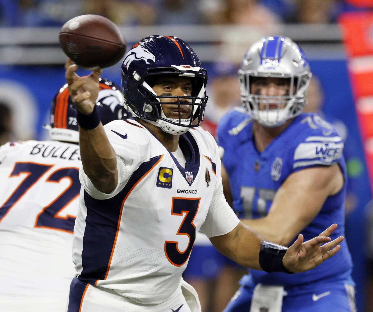 FILE - Denver Broncos quarterback Russell Wilson (3) throws during the first half of an NFL foo ...